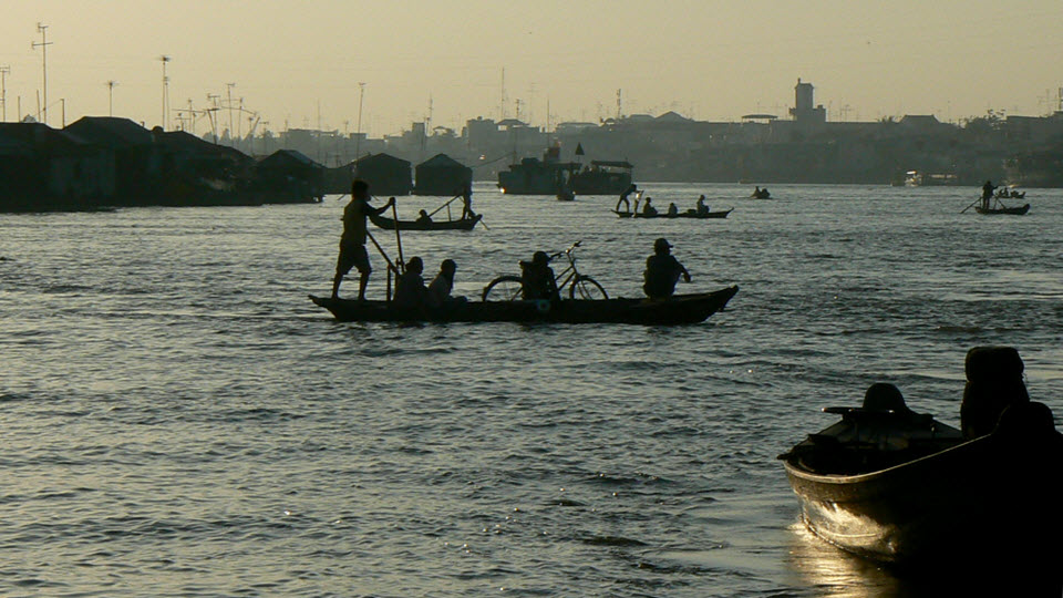 Mekong river cruise - small sampan ferry at ChauDoc market