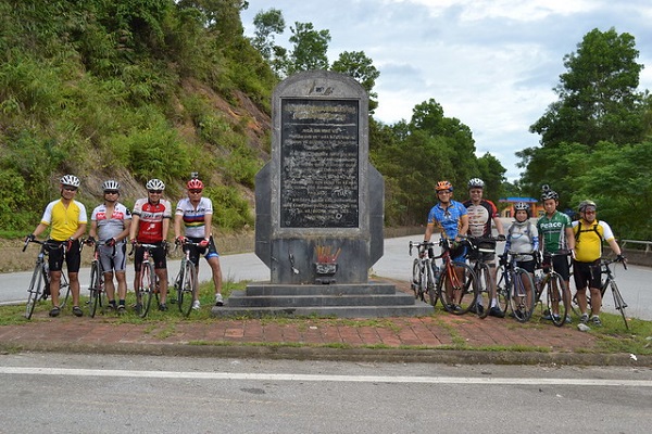 Group of cyclist from Australia and  America at Khe Ve intersection